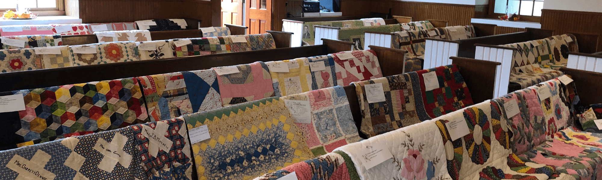 quilts-on-pews-at-beech-church